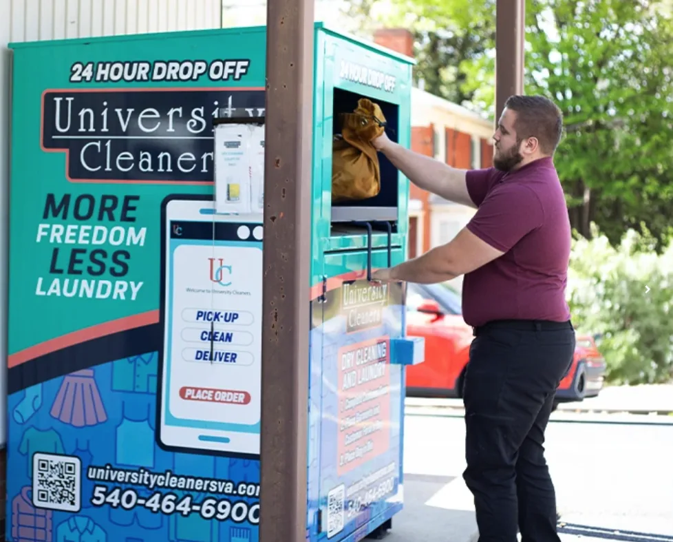 University Cleaners customer using the branded 24-hour garment locker